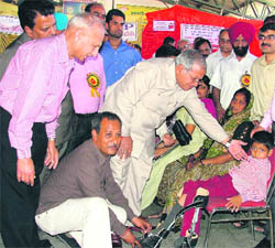Artificial limbs being given to a boy in Ludhiana.
