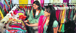 Girls take a look at designer collection in Ludhiana.