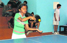 A player in action during the district open games in Ludhiana on Friday.