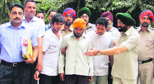 The accused being taken to the court in Ludhiana on Friday. 