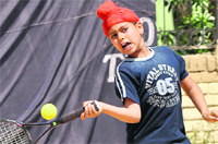 Jaskaran Singh plays a shot during a semi-finalmatch held at AKSIPS in Mohali