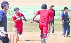 A batsman plays a defensive shot in a match during the 4th Uttarakhand Cricket Tournament in Dehradun 