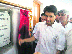 Rohtak MP Deepender Singh Hooda inaugurates a stadium hall at Rampur Kundal village on Friday. 