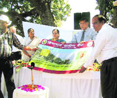 KC Chaturvedi, Deputy Governor, RBI, launches the Financial Inclusion Scheme at Kotplahari village near Nurpur on Saturday. 