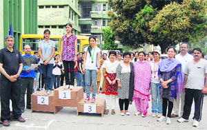 Winners of the Run-for-Fun with Principal Anil Chauhan at the DRPGMC, Tanda, on Saturday. 