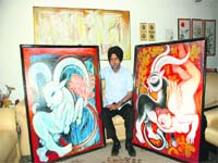 Master stroke: Satwant Singh poses along with a couple of his creations Photo: Nitin Mittal