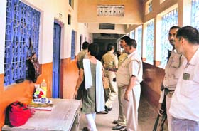 Police personnel at the childrens home in Allahabad