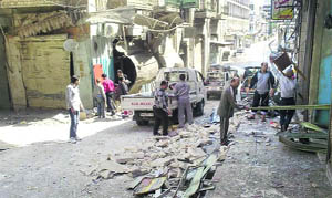 Destruction in the restive city of Hama after clashes between Syrian government forces and rebel groups.