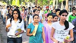 Students come out of the examination centre after appearing in the IIT-JEE examination at Dev Samaj School, Sector 21, Chandigarh, on Sunday