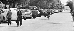 Vehicles parked on the road separating Fortis Hospital and Vikas Bhavan at Mohali