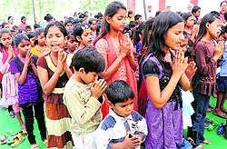 Slum children perfrom during the founders day of the World Peace Mission at Sector 49 in Chandigarh on Sunday