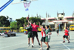 A match in progress in a basketball championship in Dehradun on Sunday