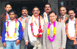 Members of the newly elected body of the HP Winter Games Association at Manali on Sunday.