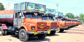 Water tankers parked outside the PHE office on BC Road in Jammu on Sunday.