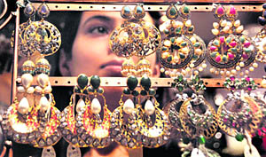 A visitor in awe of jewellery on display