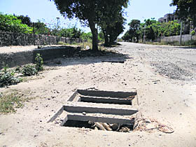 A rainwater-harvesting well in block G of Shaheed Bhagat Singh Nagar lies uncovered and full of garbage