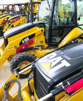 New CAT 416E industrial loaders at a Caterpillar dealership in San Antonio, Texas