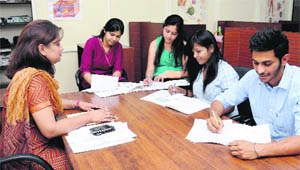 Experts provide counselling to students at the SD College, Sector 32, Chandigarh, on Monday.