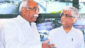 The IGP, PK Srivastava, with PGI Director Yogesh Chawla after inaugurating the CCTV camera facility at the PGI on Monday.