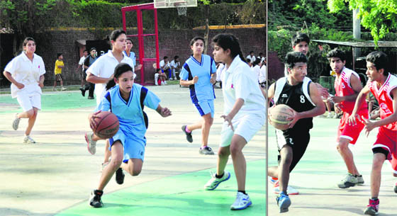 Players in action in a match in the District Junior Girls Basketball Championship in Dehradun on Monday; and (right) a boy tries to score a point in the District Junior Boys Basketball Championship.