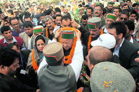 Union Minister Virbhadra Singh being welcomed by supporters at the Gaiety Theatre in Shimla on Monday.