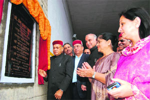 Chief Minister PK Dhumal inaugurates a tunnel near Auckland House School in Shimla on Monday. 