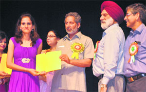 Minister for Higher Education Abdul Gani Malik and JU Vice-Chancellor MPS Ishar distribute prizes among the students of Government College for Engineering and Technology during the annual day celebrations at General Zorawar Singh Auditorium in Jammu on Monday.
