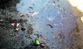 An overflowing sewer at Nandpur. Photo by writer