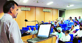Dr JS Thakur, from the WHO office, New Delhi, addresses a conference at the DMCH in Ludhiana.