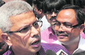 ULFA chairman Arabinda Rajkhowa (R) and other delegates of the outfit after meeting Union Home Secretary RK Singh in New Delhi on Monday