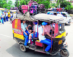 An overloaded auto-rickshaw in Amritsar