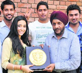 Students of Government College of Art, Sector 10, being honoured in Chandigarh