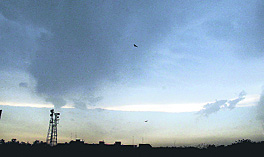 An overcast sky and dust storm bring soaring day temperature down in Jalandhar on Tuesday.