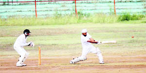 A batsman plays a shot during a match in the ongoing Rajiv Gandhi Twenty20 Cricket Tournament at MA Stadium in Jammu on Tuesday. 