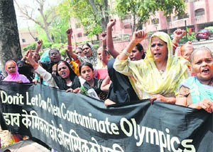 Survivors and kin of the 1984 Bhopal gas tragedy sufferers protest against Dow Chemicals sponsorship of the London 2012 Olympics, in New Delhi on Tuesday. 