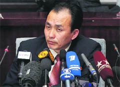 Ryu Kum-chol, deputy director of the North Korean Space Development Department, addresses a press conference in Pyongyang