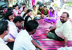 Civil Surgeon, Dr Iqbal Singh, pursuading the agitating doctors to call off their stir in the Civil Hospital on Wednesday. The Civil Surgeon assured no action will be taken against the two doctors following allegation of negligence