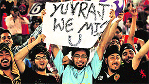Fans extend support to ailing crickter Yuvraj Singh during an IPL match at the PCA Stadium in Mohali on Thursday