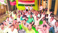 Uttarakhand Roadways employees hold a protest in support of their demands in Dehradun