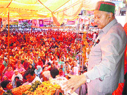 Union Minister Virbhadra Singh addresses the public at Sarkaghat in Mandi on Thursday.