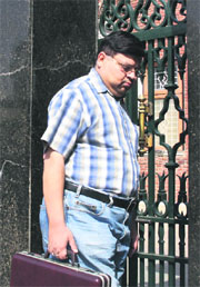 An income tax officer enters the house of BJP national secretary Capt Abhimanyu in Rohtak on Thursday. 