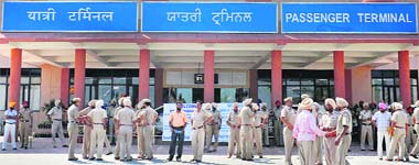 Punjab Police personnel in front of the newly-constructed Integrated Check Post at Attari on Thursday