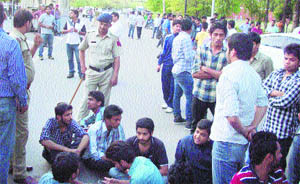 Students stage a protest at Panjab University gate number II on Friday. 