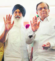 Chief Minister Parkash S Badal with Home Minister P Chidambaram at Attari on Friday.