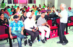 Parents and teachers of children with special needs attend a workshop at Janta Public School in Amritsar 