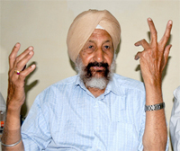 Manmohan Singh Bawa gesticulates while delivering a talk on trekking at a programme hosted in Bathinda on Saturday. 