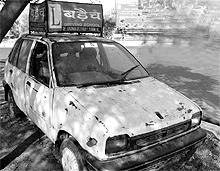 A driving school car abandoned near the Sector 14-15 roundabout in Panchkula