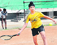 A player in action during the Manav Mangal Tennis Tournament at Phase X, Mohali, on Saturday