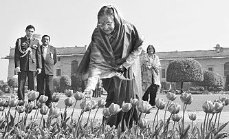 President Pratibha Patil, checking out tulips at Rashtrapati Bhavan, will also be remembered for the rather grandiose retirement home she has chosen in Pune.