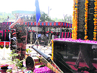 An Army officer pays tributes to martyrs at Gujjar Chowk War Memorial in Rajouri on Saturday.